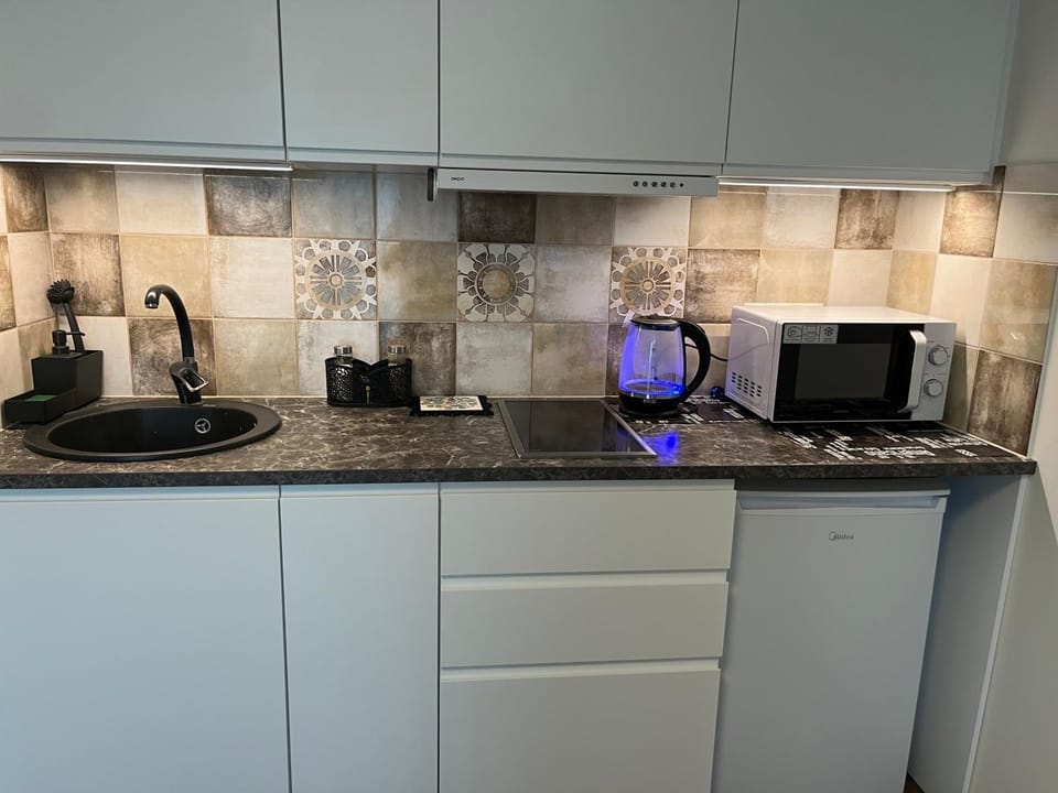 Kitchen or kitchenette, stove
