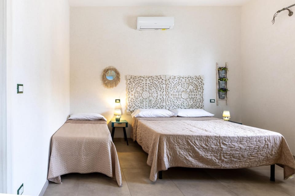 Bed, Photo of the whole room, Bedroom, towels, air conditioner
