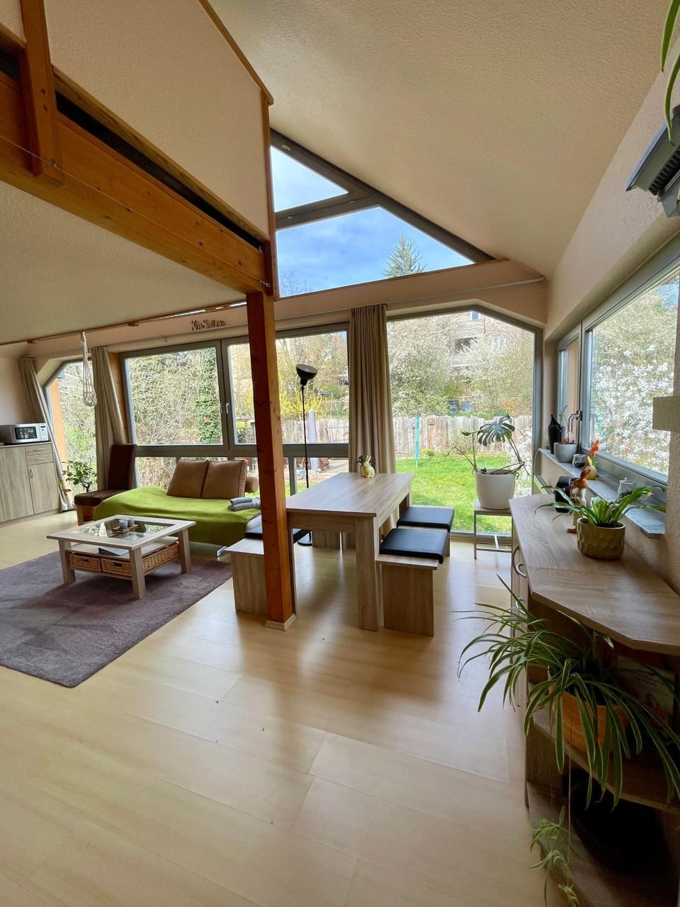 View (from property/room), Living room, Seating area, Dining area, Garden view