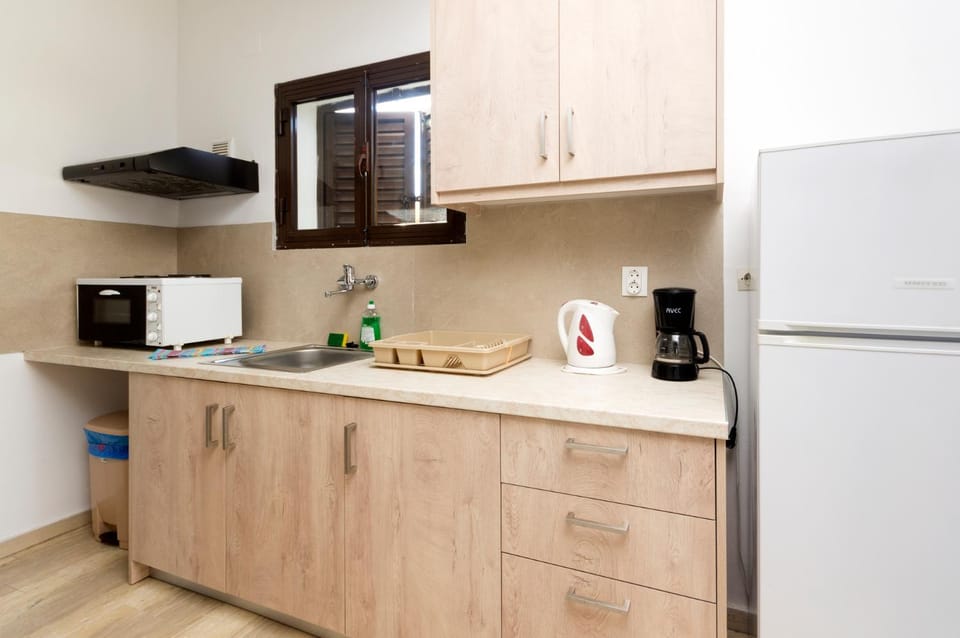 Kitchen or kitchenette, oven, stove