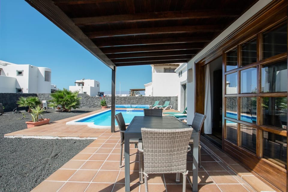 Property building, Living room, Swimming pool