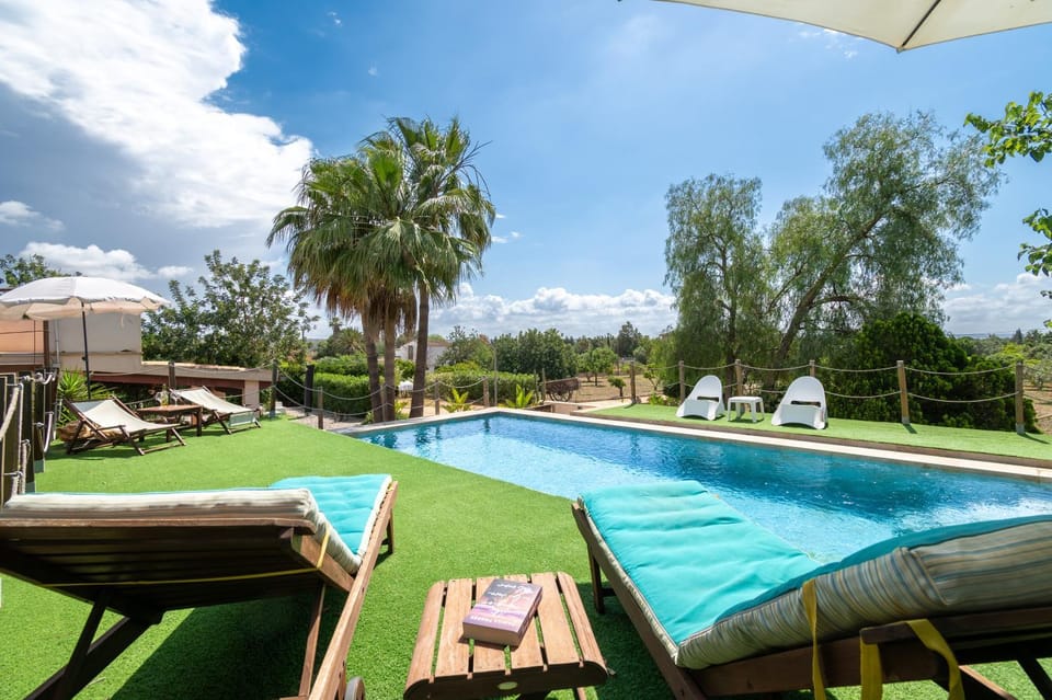 Property building, Living room, Swimming pool