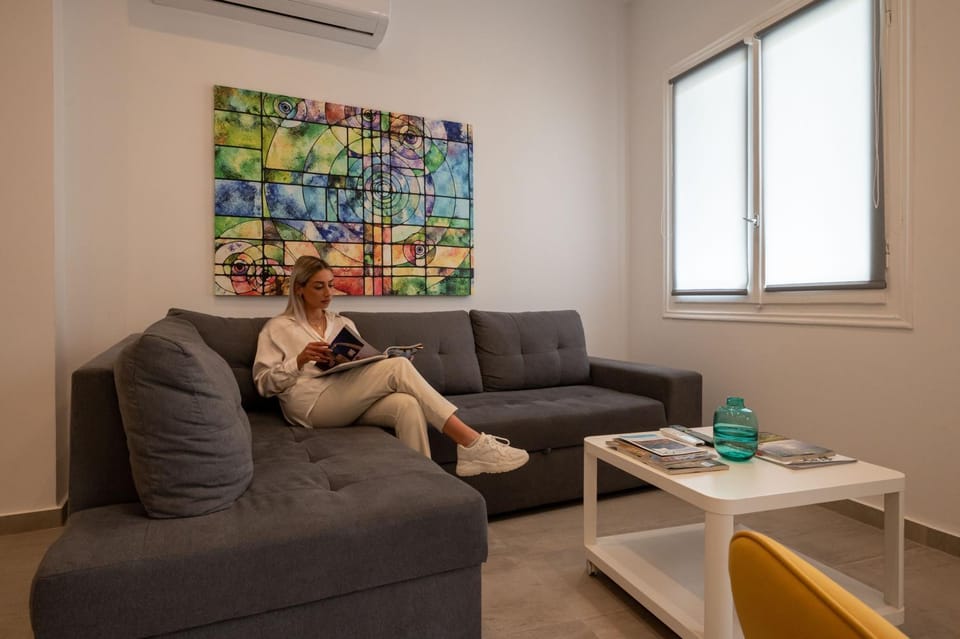 People, Living room, Seating area, air conditioner