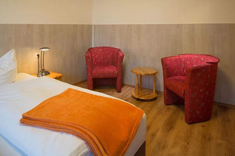 Bed, Seating area, Bedroom