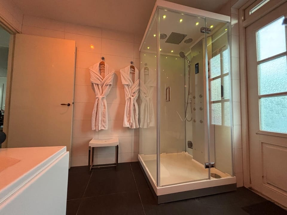 Bathroom, hair dryier, towels