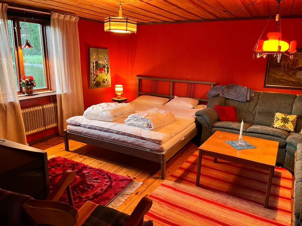 Bed, Living room, Seating area, Bedroom