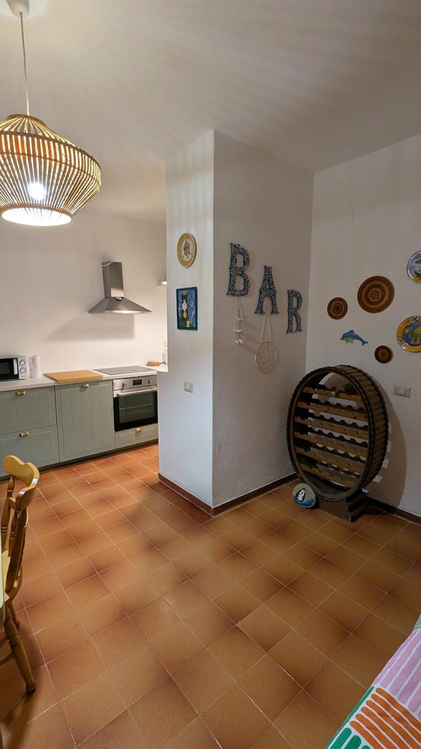 Kitchen or kitchenette, dishwasher, oven, stove