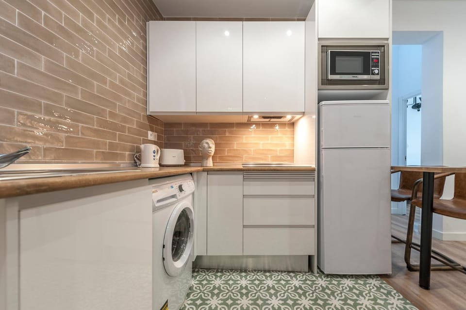 Kitchen or kitchenette, stove, toaster