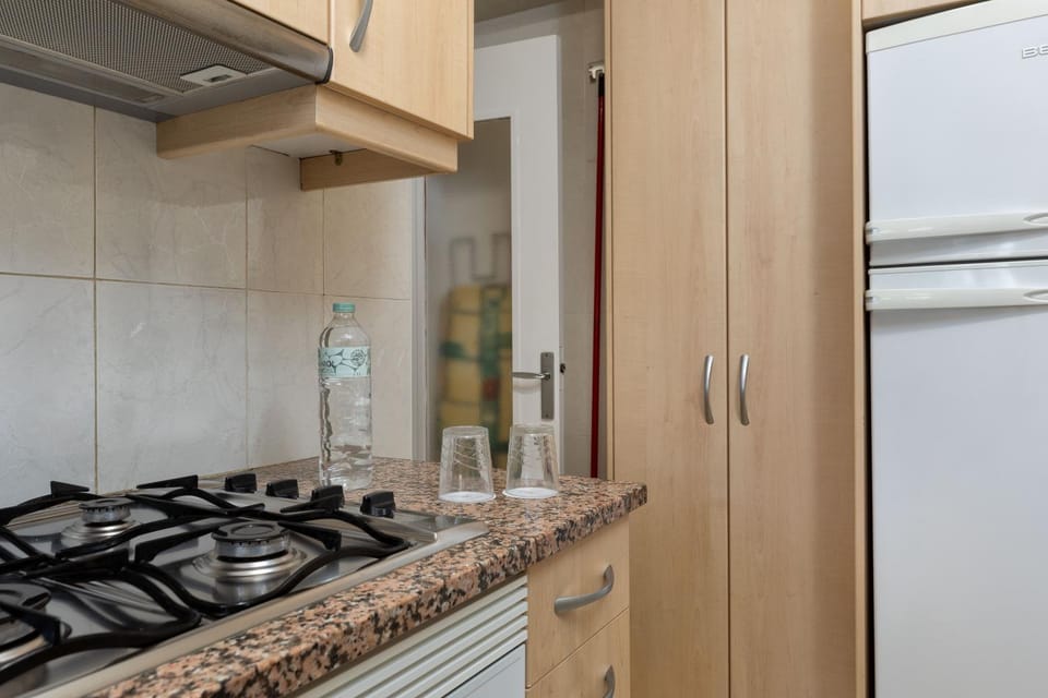 Kitchen or kitchenette, stove