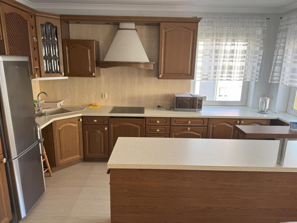 Kitchen or kitchenette, microwave, stove, kitchen