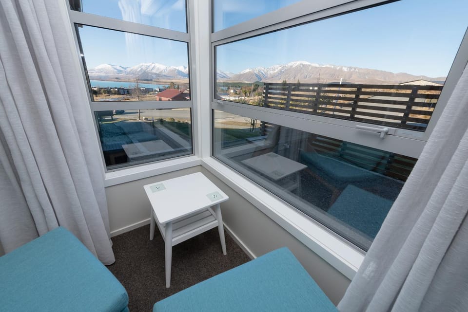 Natural landscape, View (from property/room), Seating area, Bedroom, Lake view, Mountain view