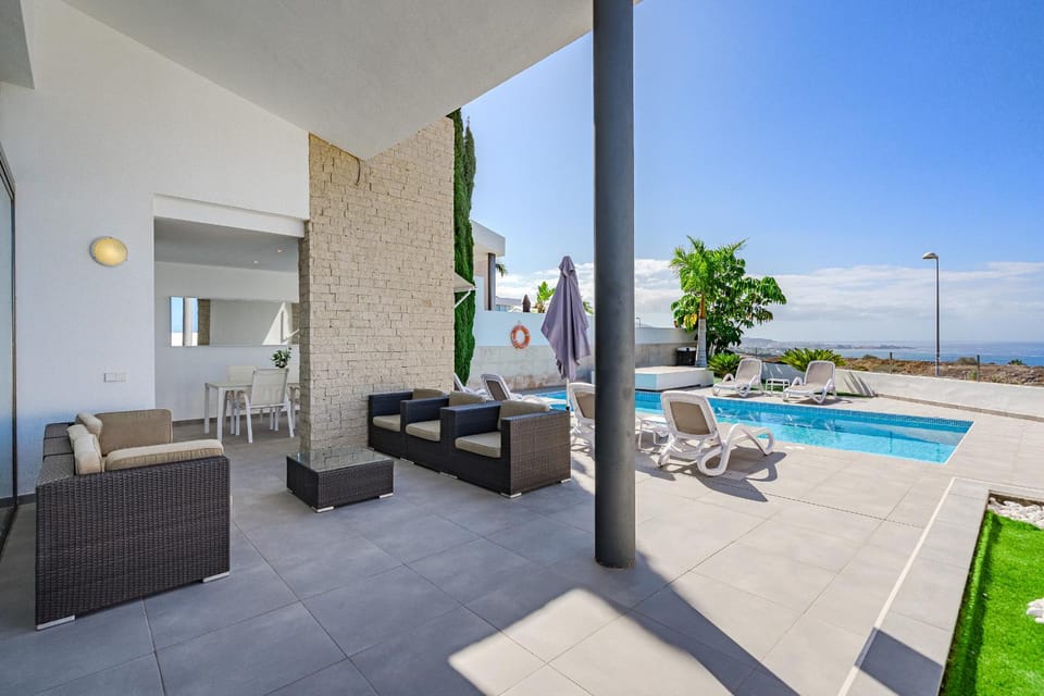 Patio, Day, Natural landscape, View (from property/room), Balcony/Terrace, Living room, Seating area, Pool view, Sea view, Swimming pool, sunbed