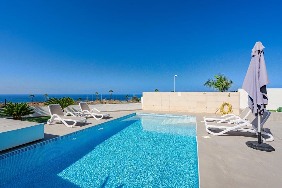 Day, Natural landscape, Pool view, Sea view, Swimming pool, sunbed, towels
