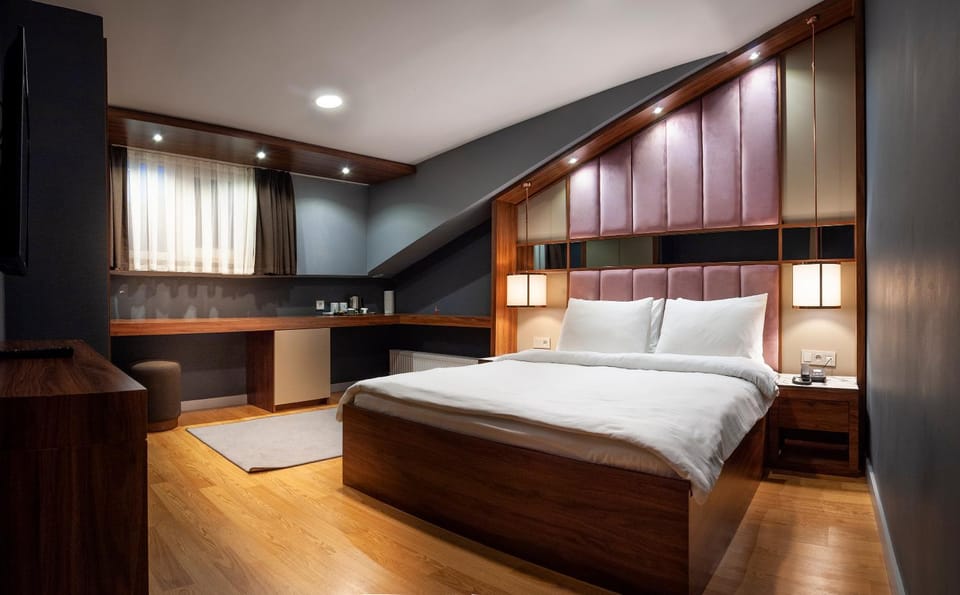 Bed, Kitchen or kitchenette, Bedroom, towels, wardrobe, air conditioner
