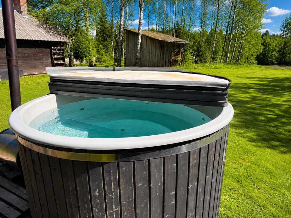 Lake Deer Park Retreat with Hot Tub & Sauna Nature lodge in Latvia