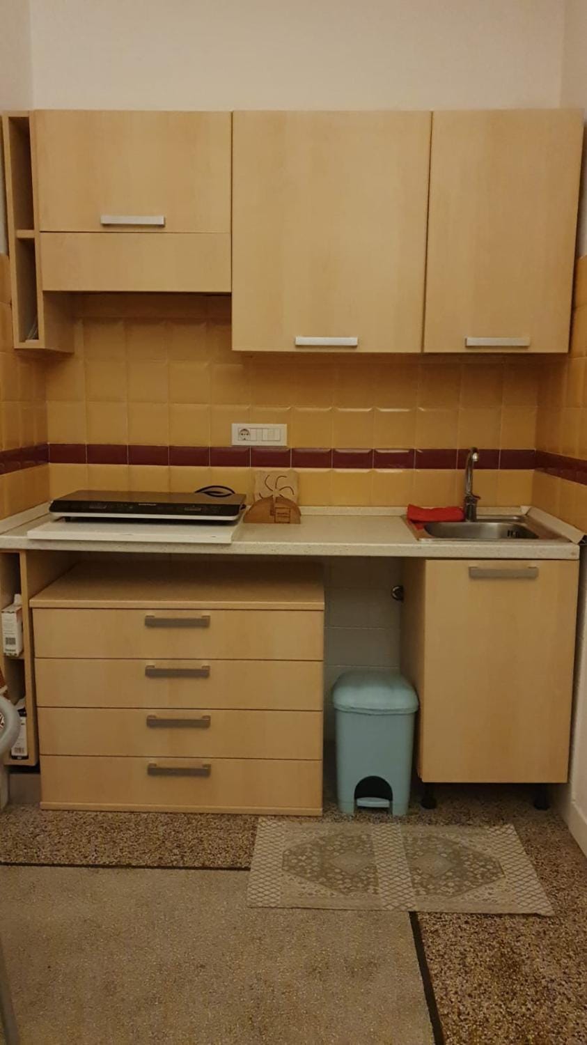 Kitchen or kitchenette, stove