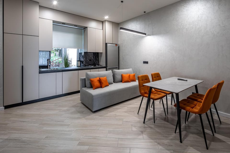 Kitchen or kitchenette, Living room, Seating area, Dining area