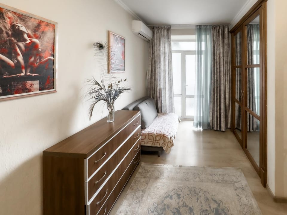 Bed, Living room, Seating area, Bedroom