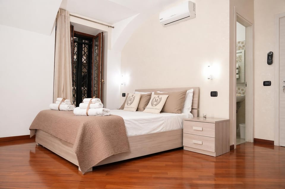 Photo of the whole room, Bedroom, towels, air conditioner