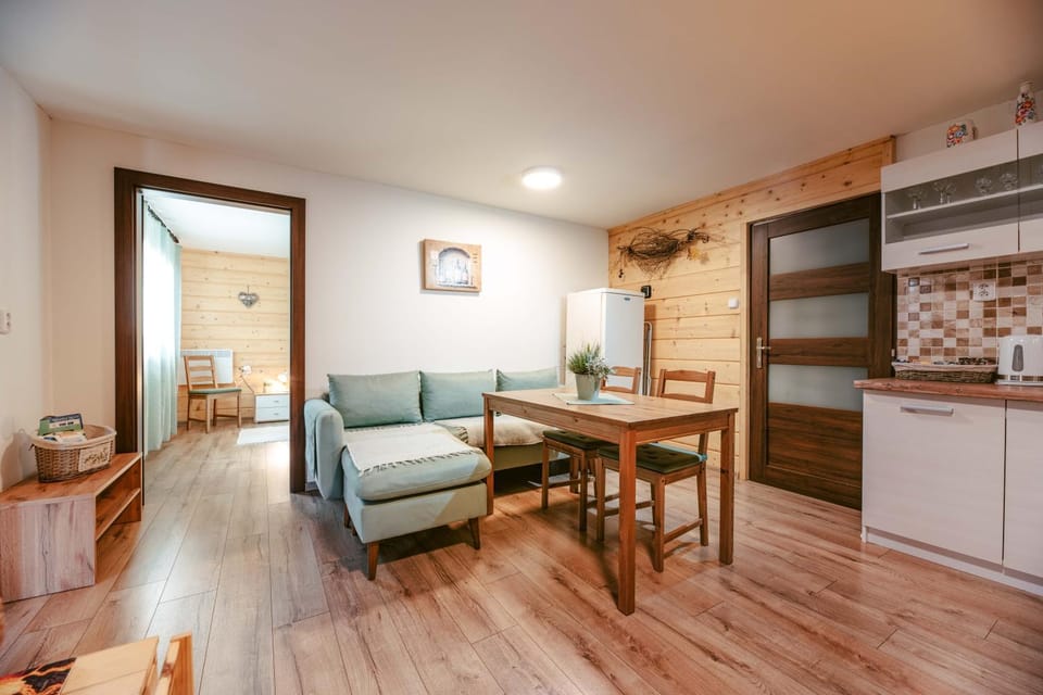 Kitchen or kitchenette, Living room, Seating area, Dining area