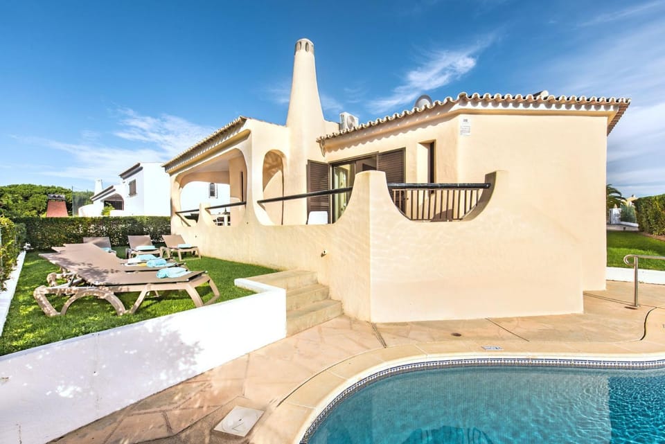 Old Village Area and close to all amenities, Overlooking Golf Course Villa in Quarteira