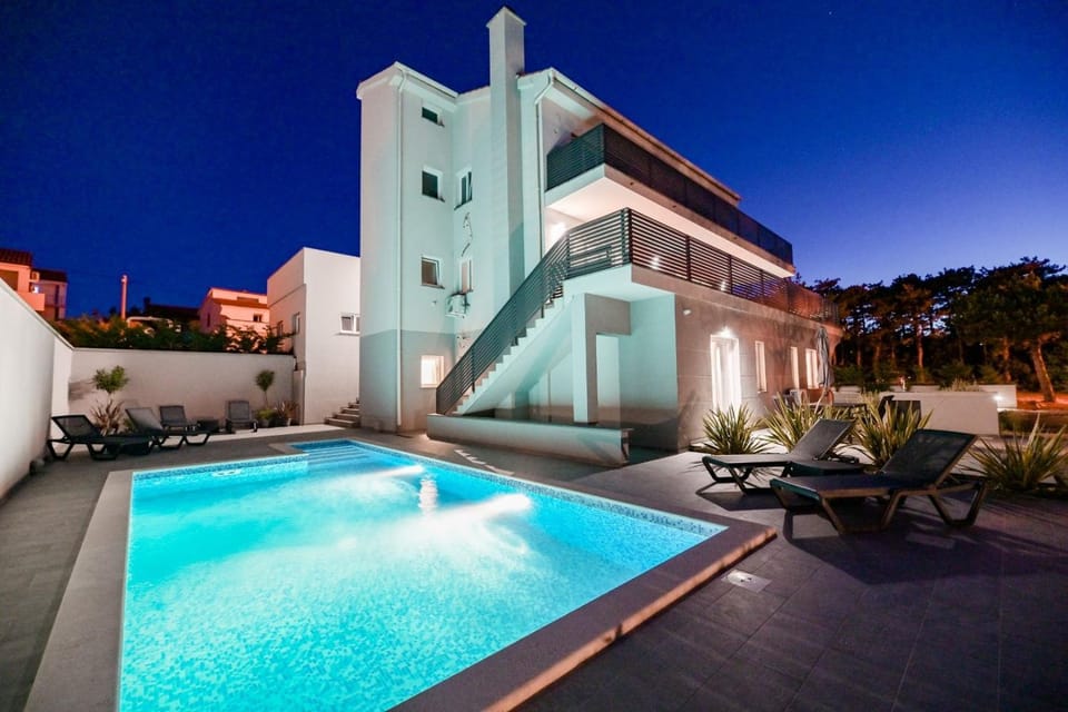 Property building, Night, Swimming pool
