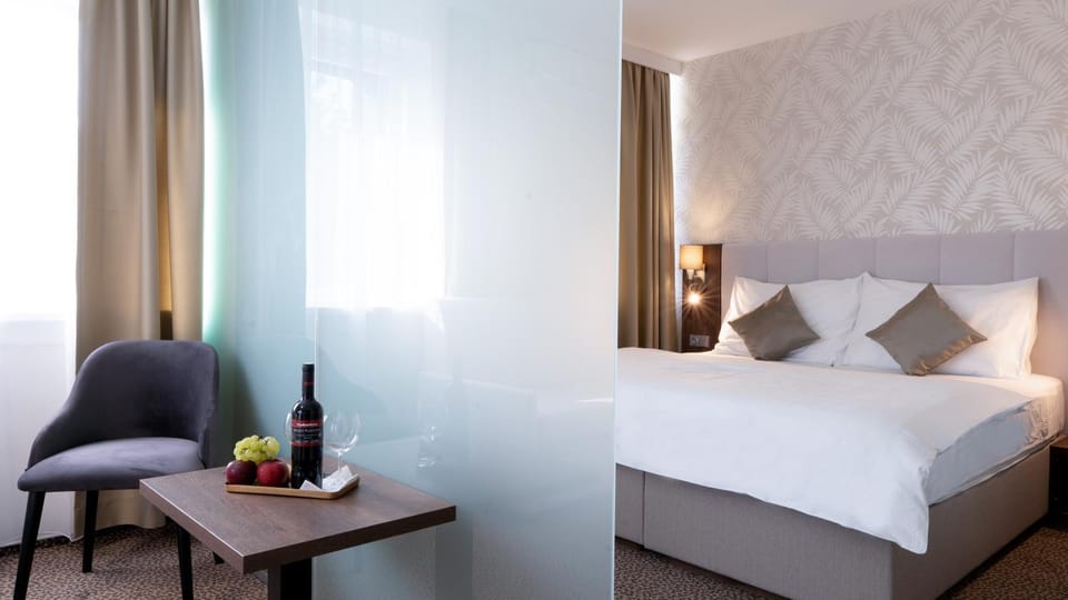 Bed, Living room, Seating area, Bedroom