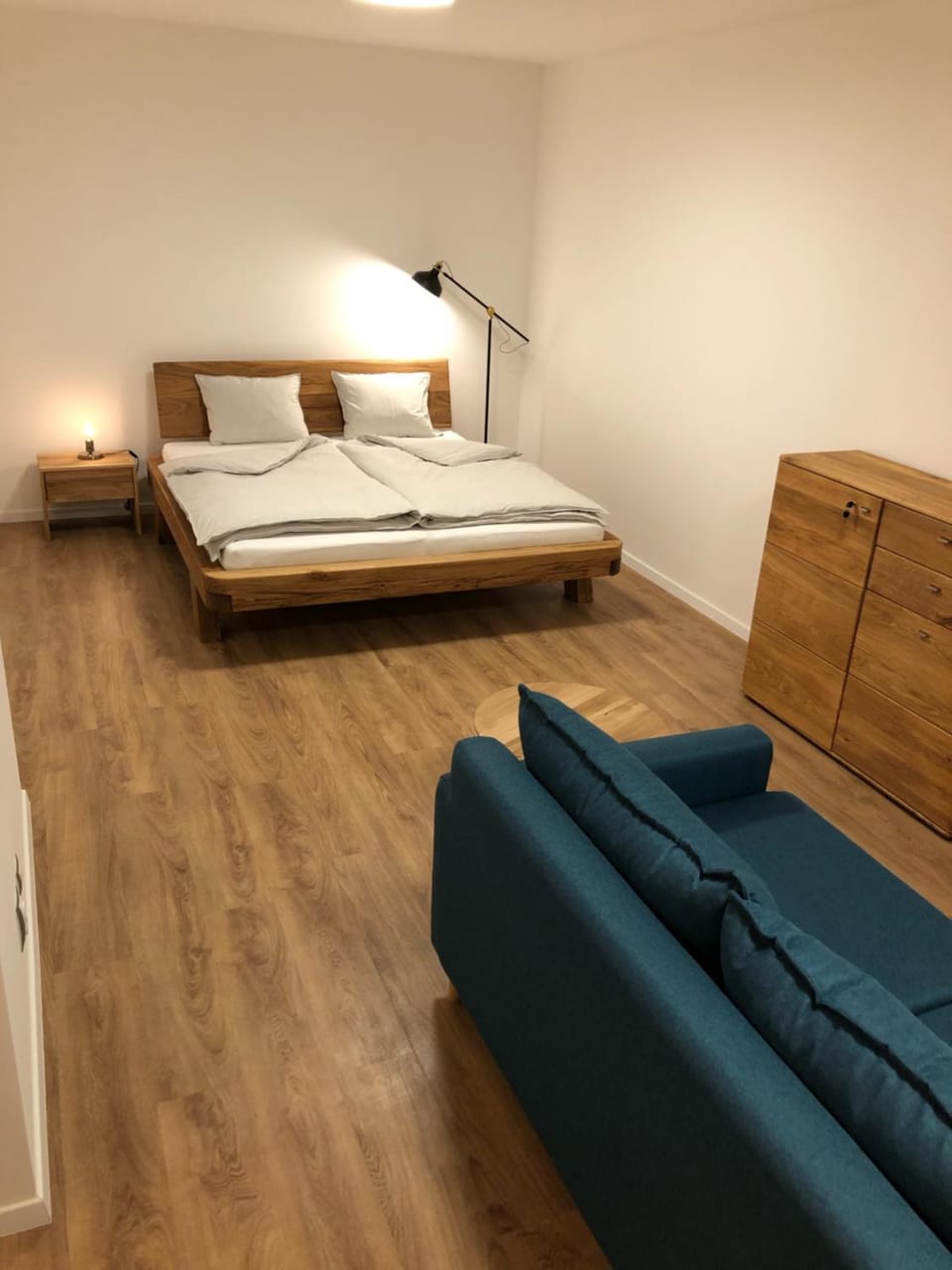 Bed, Living room, Seating area, Bedroom