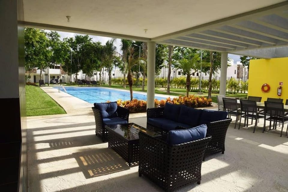 Communal lounge/ TV room, Garden, Swimming pool