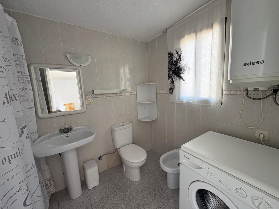 Bathroom, bidet, washing machine