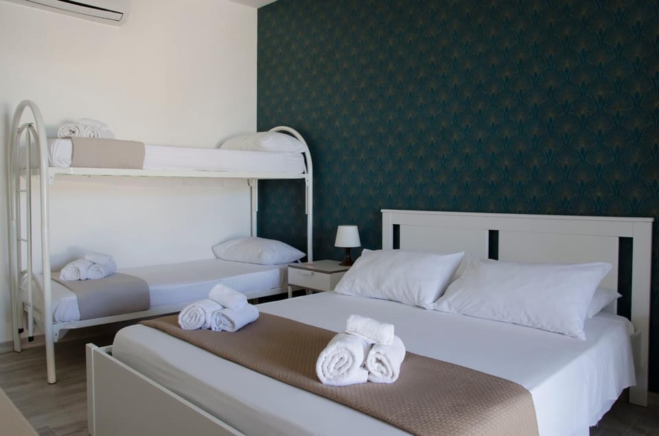Bed, Photo of the whole room, Bedroom, towels, air conditioner