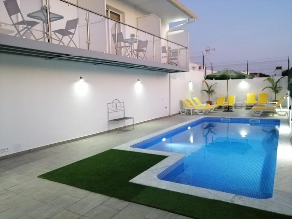 Property building, Patio, Day, Balcony/Terrace, Pool view, Swimming pool, sunbed