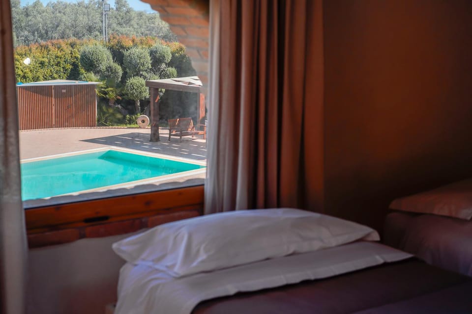 Bed, Day, Photo of the whole room, Bedroom, Pool view, Swimming pool