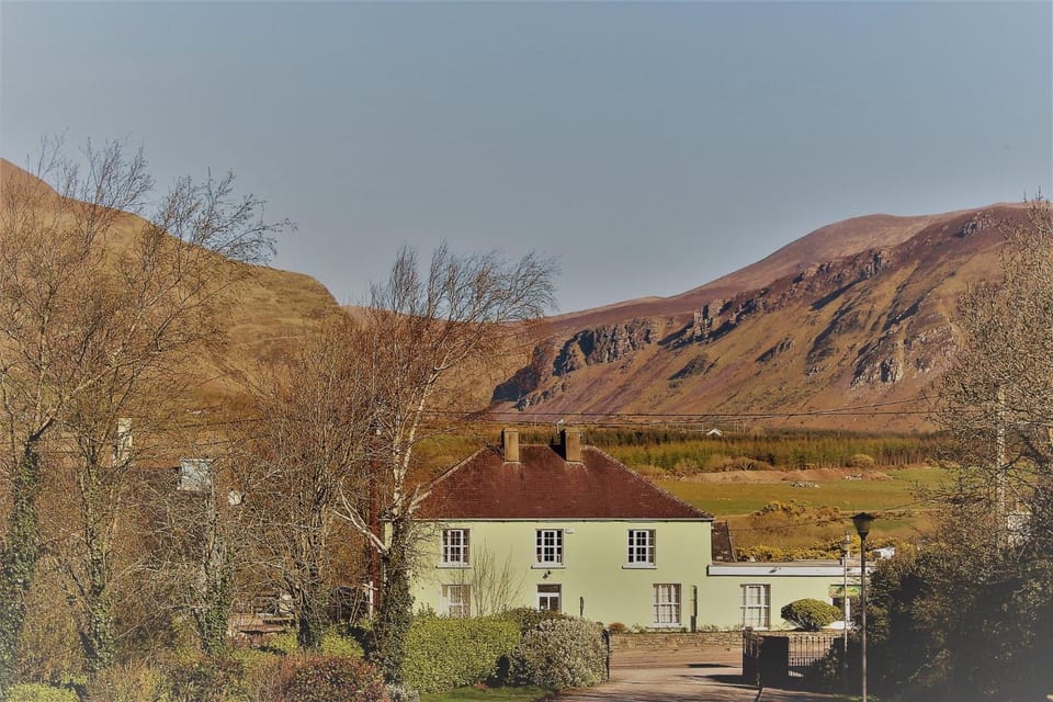 Property building, Facade/entrance, Natural landscape, Bird's eye view, Hiking, Mountain view