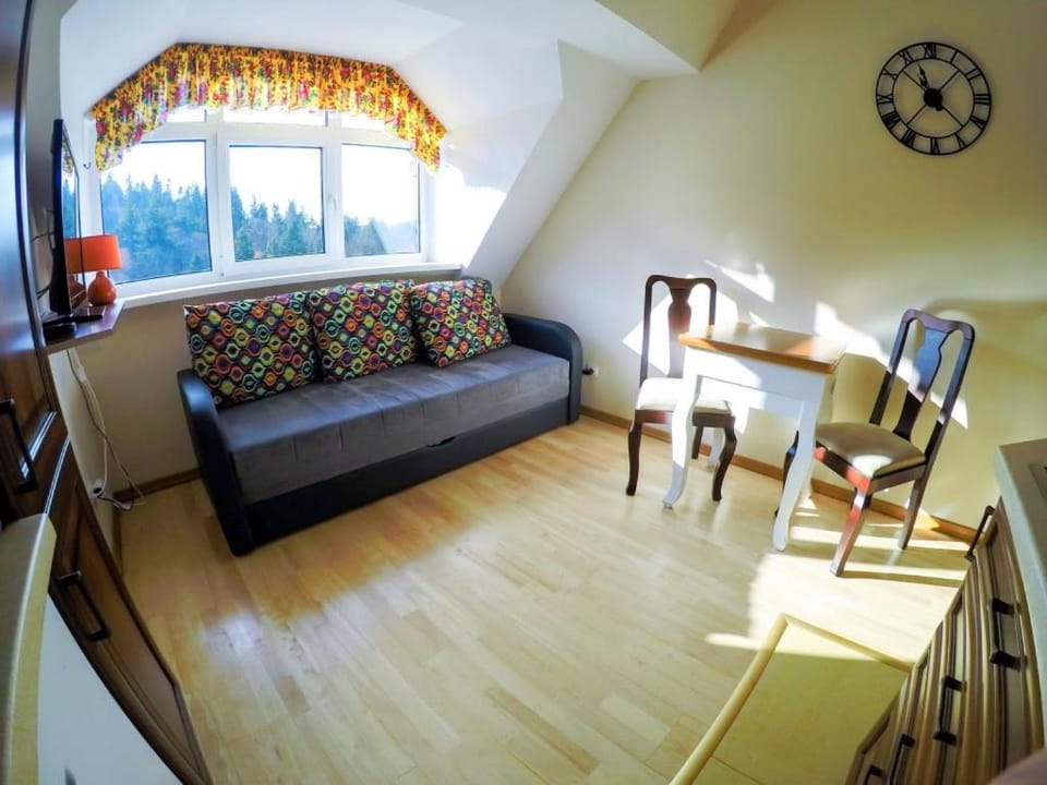 Bed, Living room, Seating area, Bedroom