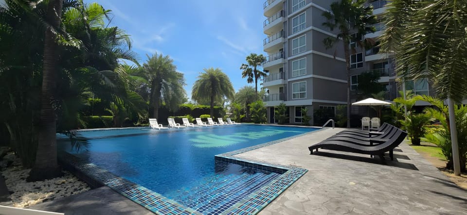 Property building, Pool view, Swimming pool, sunbed