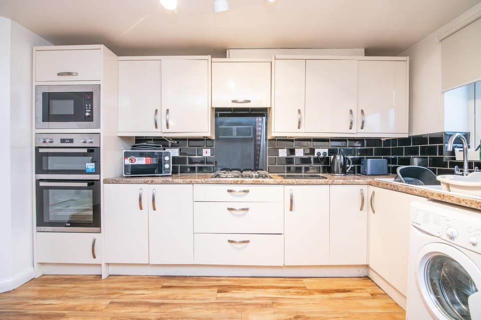 Kitchen or kitchenette, oven, stove, toaster, kitchen