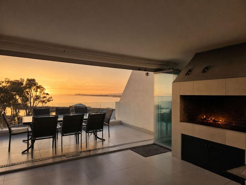 Patio, Seating area, Landmark view, Sunset, fireplace