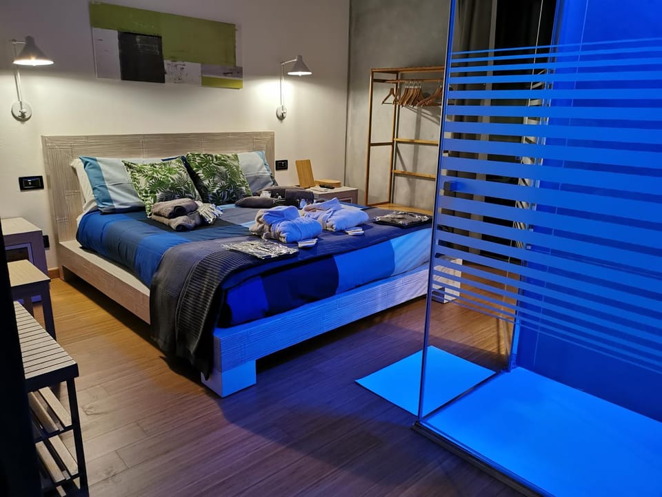 Shower, Bed, Night, Bathroom, Balcony/Terrace, Photo of the whole room, Decorative detail, Bedroom, microwave