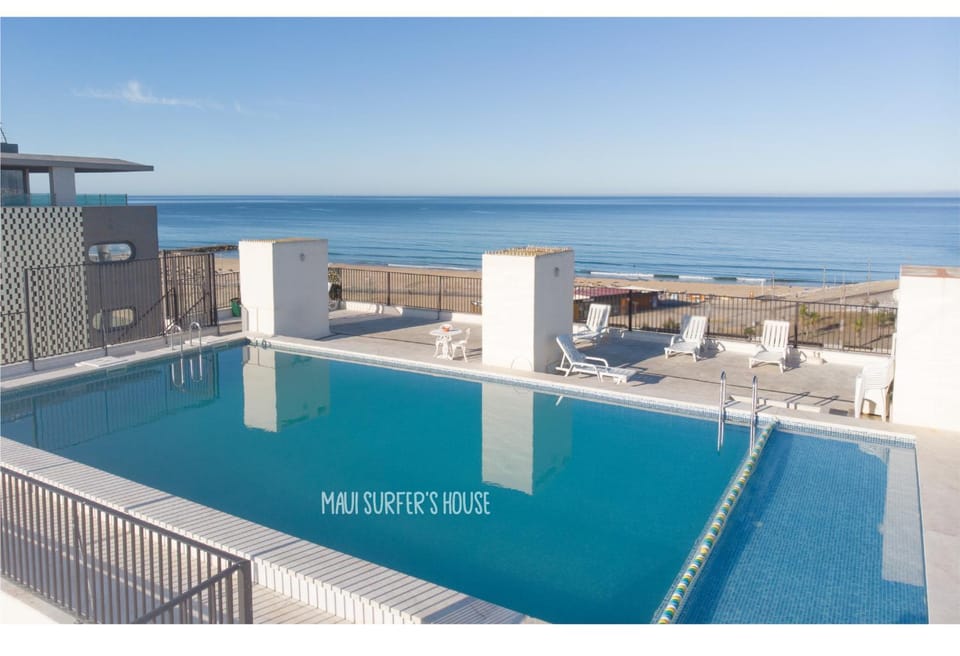 Property building, Natural landscape, Beach, Pool view, Sea view, Swimming pool, Entertainment, sunbed