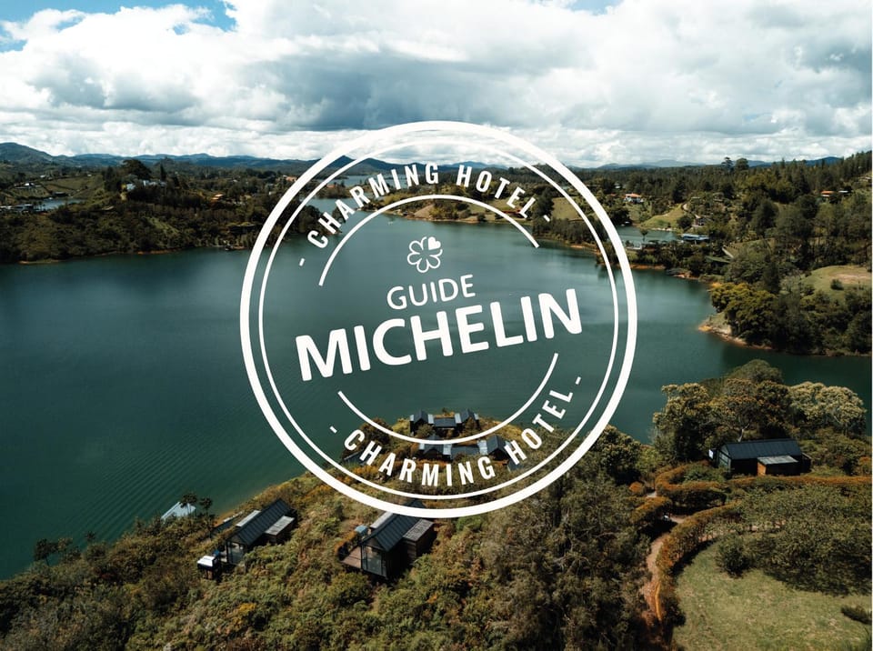 Nearby landmark, Day, Natural landscape, Logo/Certificate/Sign, Text overlay, Lake view, Certificate/Award