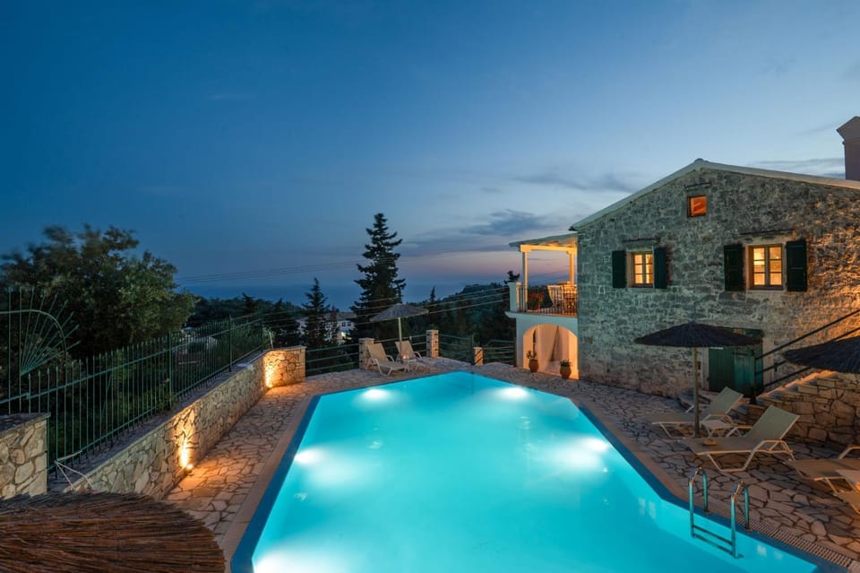 Property building, Night, Natural landscape, Pool view, Swimming pool, sunbed