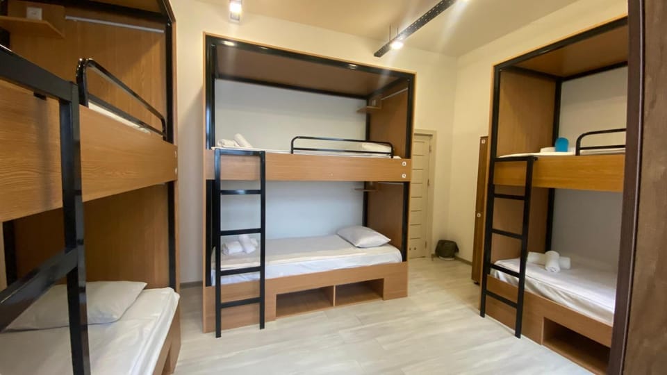 bunk bed, towels, wardrobe, air conditioner
