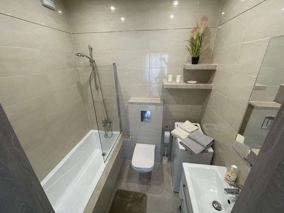Shower, Bathroom, Bath, hair dryier, towels, laundry, washing machine