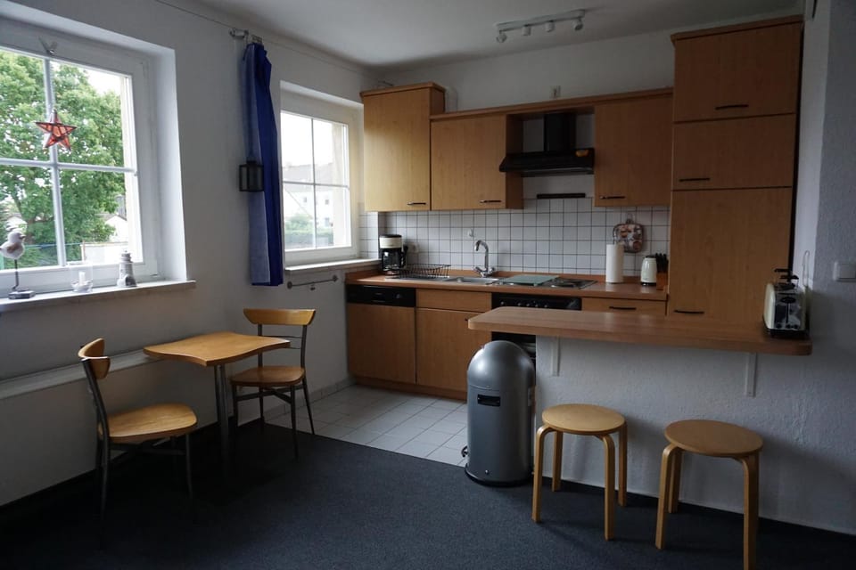 Kitchen or kitchenette, Living room, Seating area, Bedroom