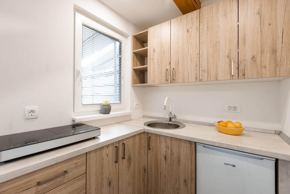 Kitchen or kitchenette, stove