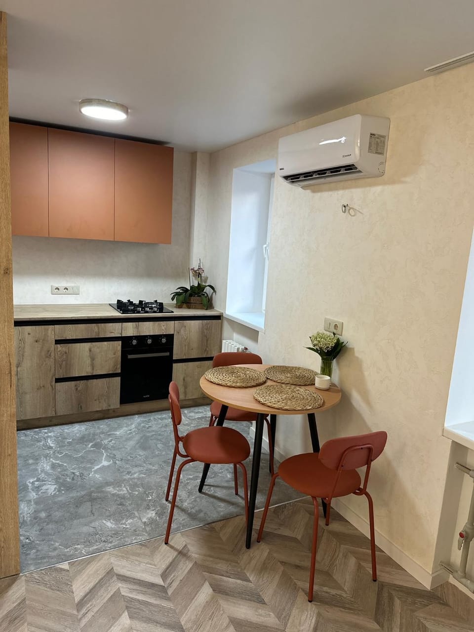Kitchen or kitchenette, oven, stove, air conditioner