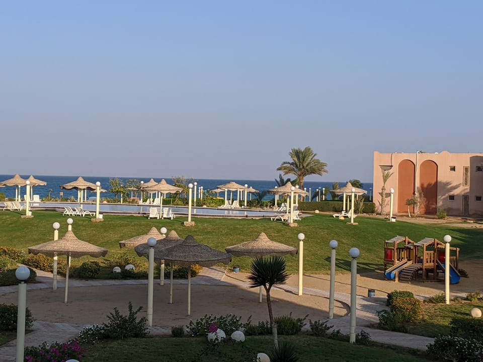 Shower, Staff, Children play ground, Fishing, Garden, Garden, Snorkeling, Seating area, Beach, Aqua park, Garden view, Pool view, Sea view, Swimming pool, young children, older children, group of guests, Family