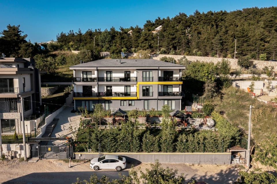 Property building, Spring, Natural landscape, Bird's eye view, Mountain view, Location