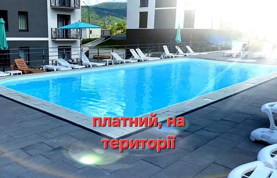 Swimming pool, sunbed
